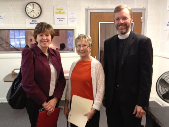 Sue Nahmensen and Deb Schmich from LESA, the Lutheran Elementary School Association, with Rev. Randy Asburry.