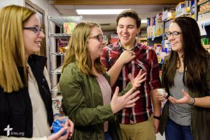 Sarah Franklin (left) and Isabella Schneider (center) talk with Jacob Welch and Emma Tharp, all of Immanuel Lutheran Church & School in St. Charles, Mo., after they delivered food pantry items on Sunday, Feb. 26, 2017, to Oasis Food Pantry in St. Charles. LCMS Communications/Erik M. LunsfordLCMS Communications/Erik M. Lunsford