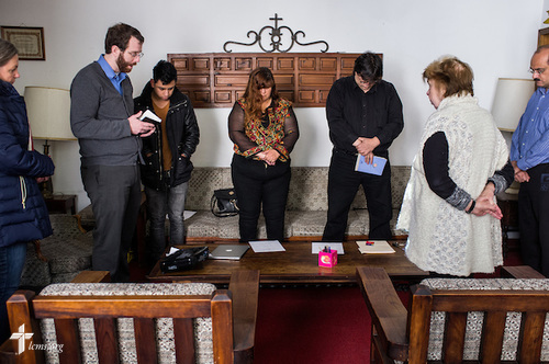 The Rev. Andrew Schlund, LCMS missionary to Mexico, prays with his parishioners before a council meeting at Lutheran Church of The Good Shepherd on Saturday, Jan. 14, 2017, in Mexico City. Standing with Schlund are, left to right, Debora Potter, Jimmy Zeferimo, Nancy Rosete and Alejandro Arevalo, David Linares and Nory Bazzano Mastelli. LCMS Communications/Erik M. Lunsford