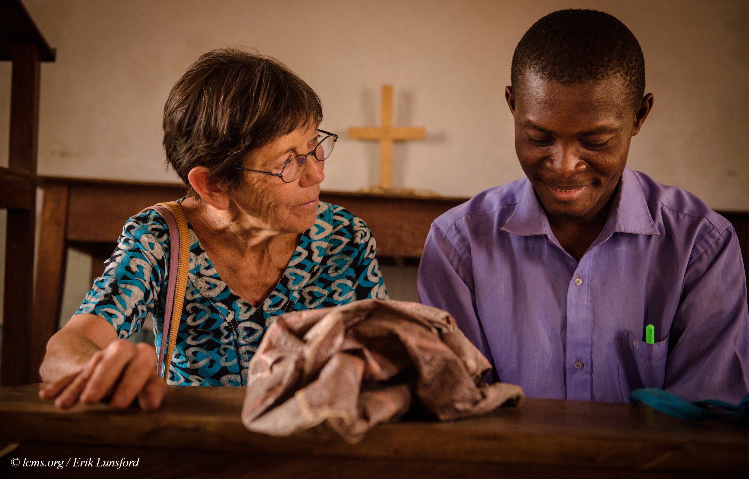 Valerie Stonebreaker, LCMS missionary to Togo, confers with Vicar Djekoab Yantchiemaen following Bible study at the Lutheran Church of Togo in Lokpano on Monday, Feb. 13, 2017, in Lokpano, Togo. Yantchiemaen graduated at the Lutheran Center for Theological Studies (CLET) in Dapaong. LCMS Communications/Erik M. Lunsford