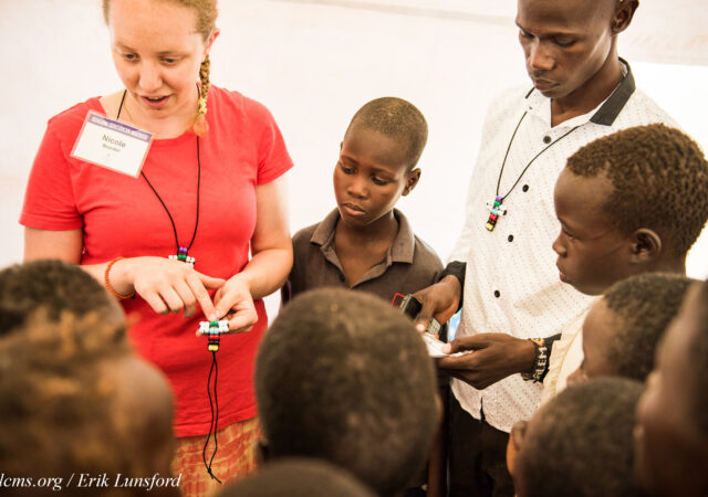 Nicole Boeder, a teacher and a member of Trinity Lutheran Church, Springfield, Ill., witnesses to children about Jesus during the LCMS Mercy Medical Team on Tuesday, June 21, 2016, in Nataparkakono, a village in Turkana, Kenya. LCMS Communications/Erik M. Lunsford