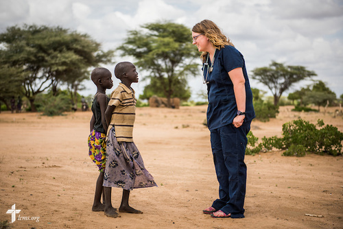 Sarah Kanoy, a career missionary in East Africa and part of a LCMS Mercy Medical Team, greets residents of a village on Monday, June 20, 2016, in Turkana, Kenya. LCMS Communications/Erik M. Lunsford