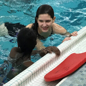 LHSS student instructs a swim lesson.