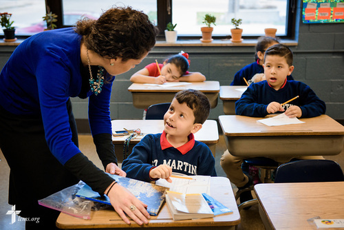 Principal Julieane Cook spends time with students while visiting classrooms at St. Martini Lutheran School on Tuesday, Nov. 14, 2017, in Milwaukee. LCMS Communications/Erik M. Lunsford