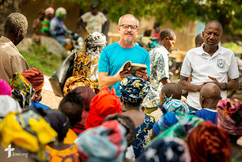 The Rev. Gary Schulte, area director for West and Central Africa, leads a devotion on the first day of the LCMS Mercy Medical Team on Monday, May 7, 2018, in the Yardu village outside Koidu, Sierra Leone, West Africa. LCMS Communications/Erik M. Lunsford