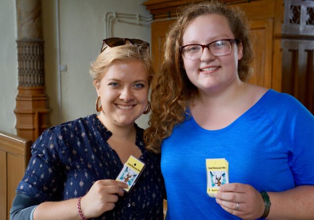 Photo: GEO Missionary Sarah Harms and a teen from Immanuel Lutheran Church in Broken Arrow, OK, hold up the “take home” cards for the day of “God Rescues Me” at an Engligh Bible Camp in Poland. LCMS/Benjamin Helge Used with permission.