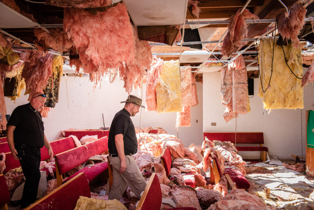 The Rev. Eric C. Johnson, president of the LCMS Southern District, and the Rev. Michael Meyer, manager of LCMS Disaster Response, survey the catastrophic damage from Hurricane Michael to Redemption Lutheran Church, Panama City, Fla., on Monday, Oct. 15, 2018. LCMS Communications/Erik M. Lunsford