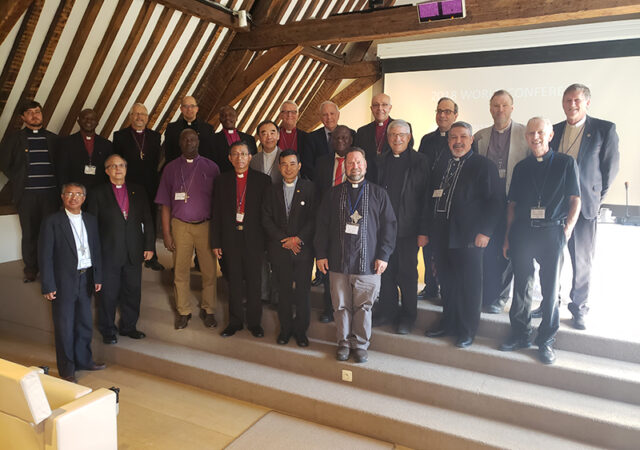 The International Lutheran Council’s Executive Committee pose with representatives of new member churches. Used with permission