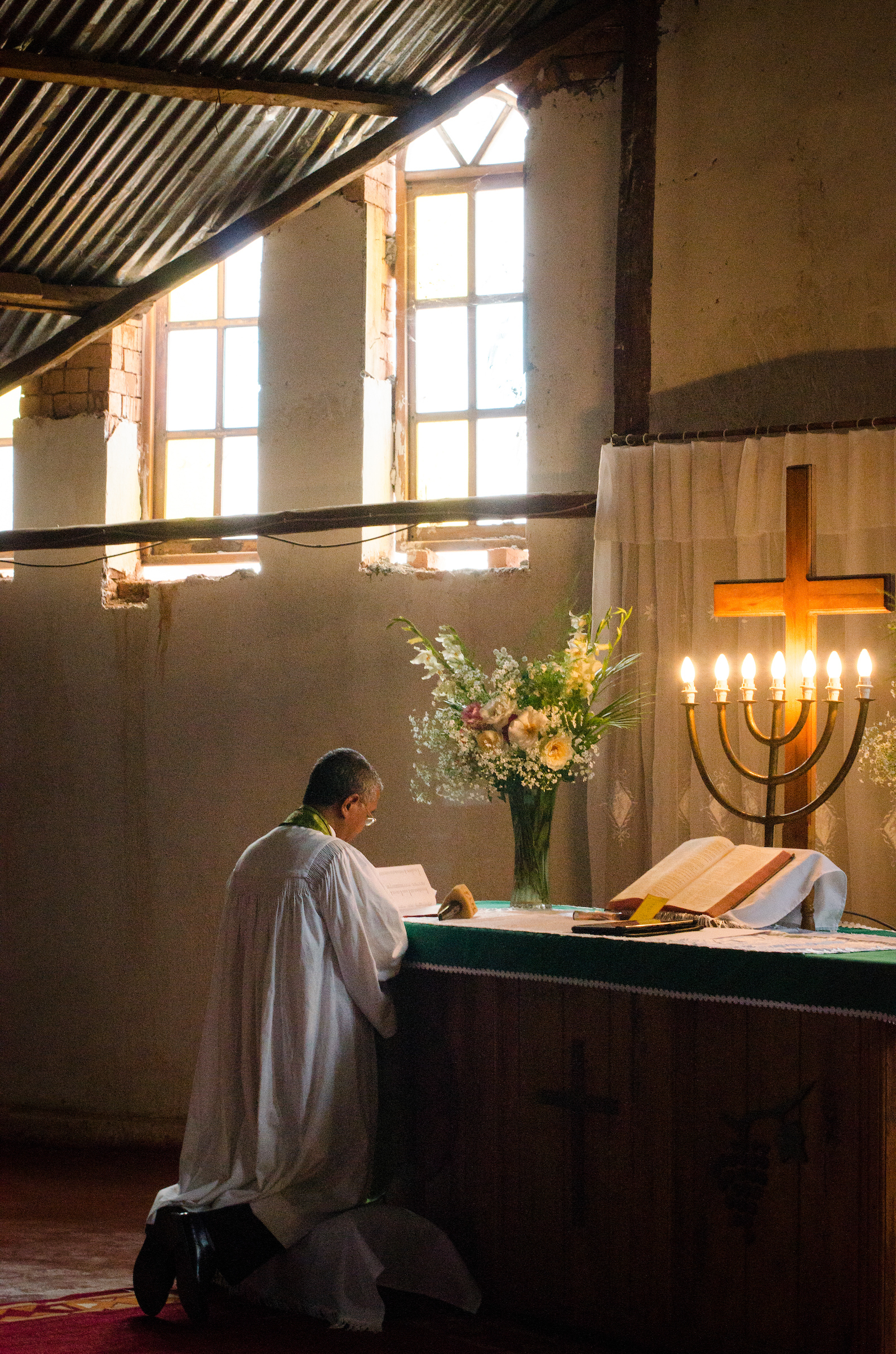 Fiangonana Loterana Malagasy Bishop David Rakotonirina leads worship at Ivato Lutheran Church in the capital city of Antananarivo in Madagascar, on Sunday, Feb. 9, 2014. LCMS Communications/Erik M. Lunsford