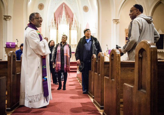The Rev. Delwyn Campbell, national missionary to Gary, Ind., chats with parishioners following a Lenten service at St. John's Lutheran Church on Wednesday, April 5, 2017, in Gary. LCMS Communications/Erik M. Lunsford