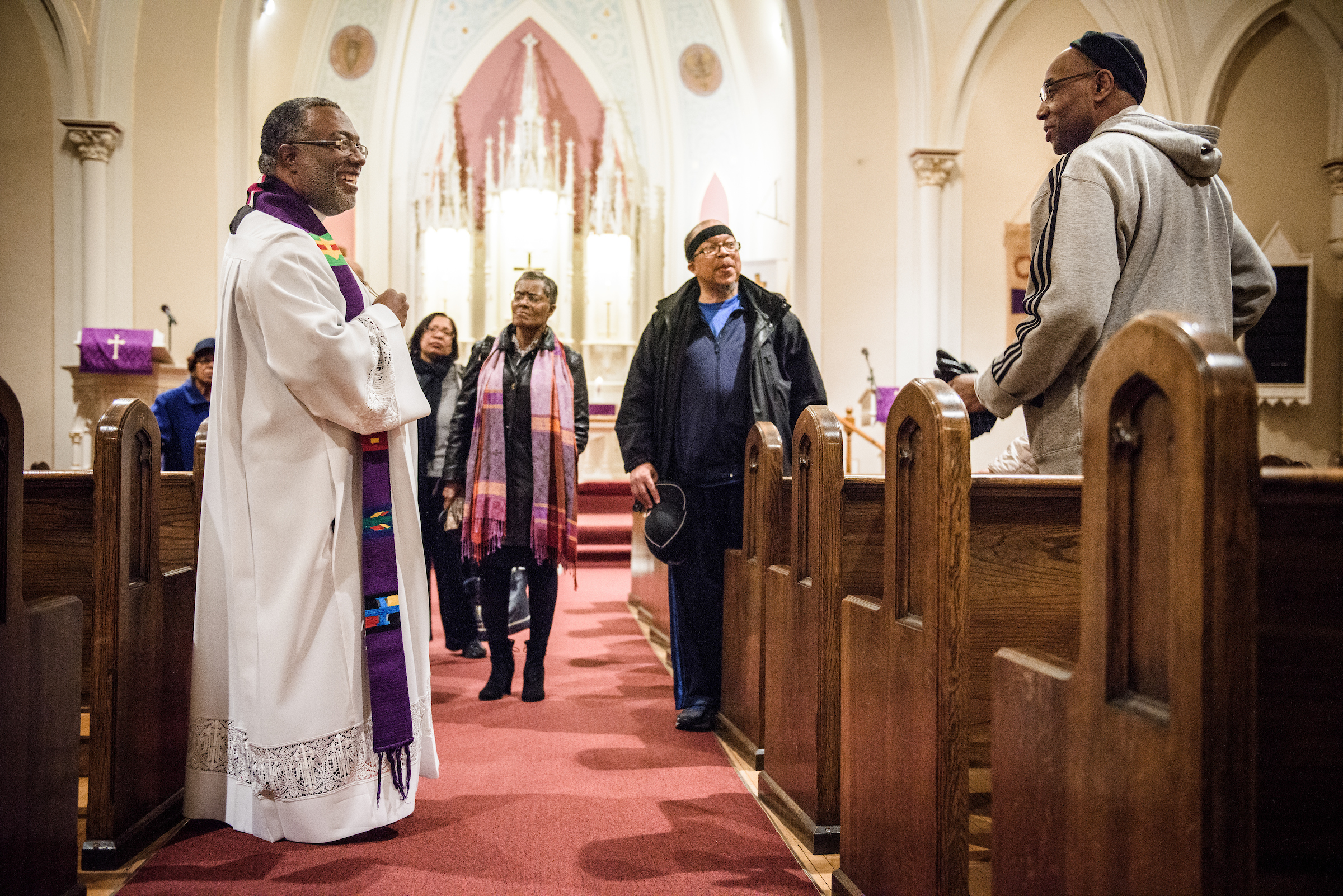 The Rev. Delwyn Campbell, national missionary to Gary, Ind., chats with parishioners following a Lenten service at St. John's Lutheran Church on Wednesday, April 5, 2017, in Gary. LCMS Communications/Erik M. Lunsford