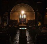 Sunlight streams through the stained glass windows above the altar at Risen Savior Lutheran Church before worship on Sunday, March 31, 2019, in Basehor, Kan. LCMS Communications/Erik M. Lunsford